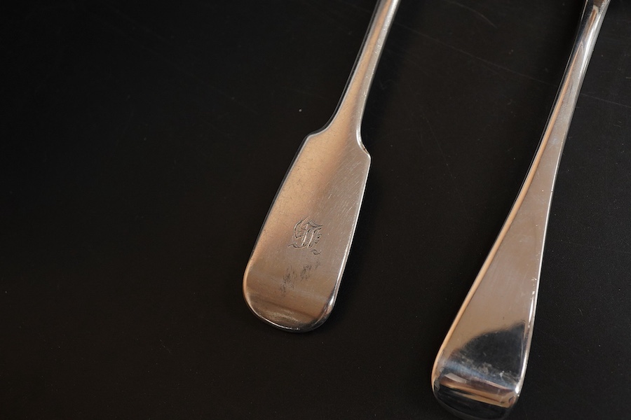 A pair of Edwardian silver Old English pattern sauce ladles, by Daniel & John Welby, London, 1901, 17.3cm, together with seven other items of silver flatware including a fiddle pattern table spoon, London, 1845 and a mot